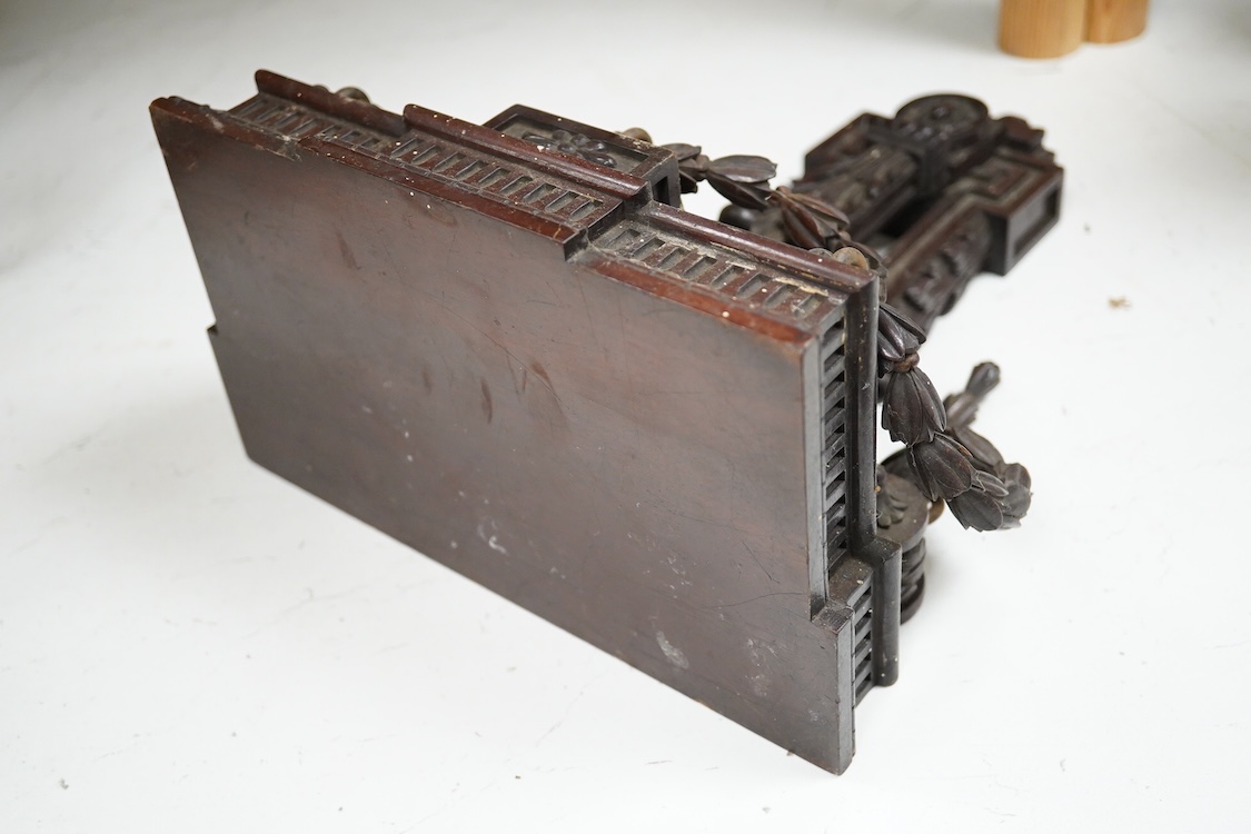 A late 19th century carved mahogany wall bracket, 35cm high